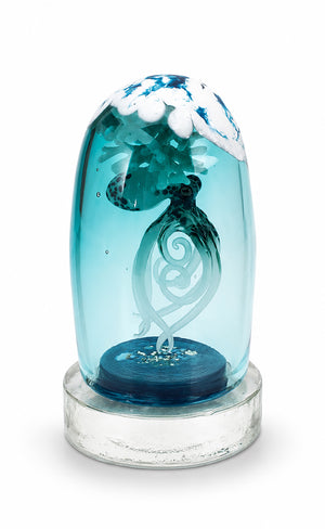Stillwater glass sculpture featuring an octopus with curling tentacles enclosed within a blue glass dome on a clear circular base.
