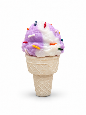 Glass ice cream sculpture with a purple and white swirled scoop, colorful sprinkles, and an ivory waffle cone on a white background.
